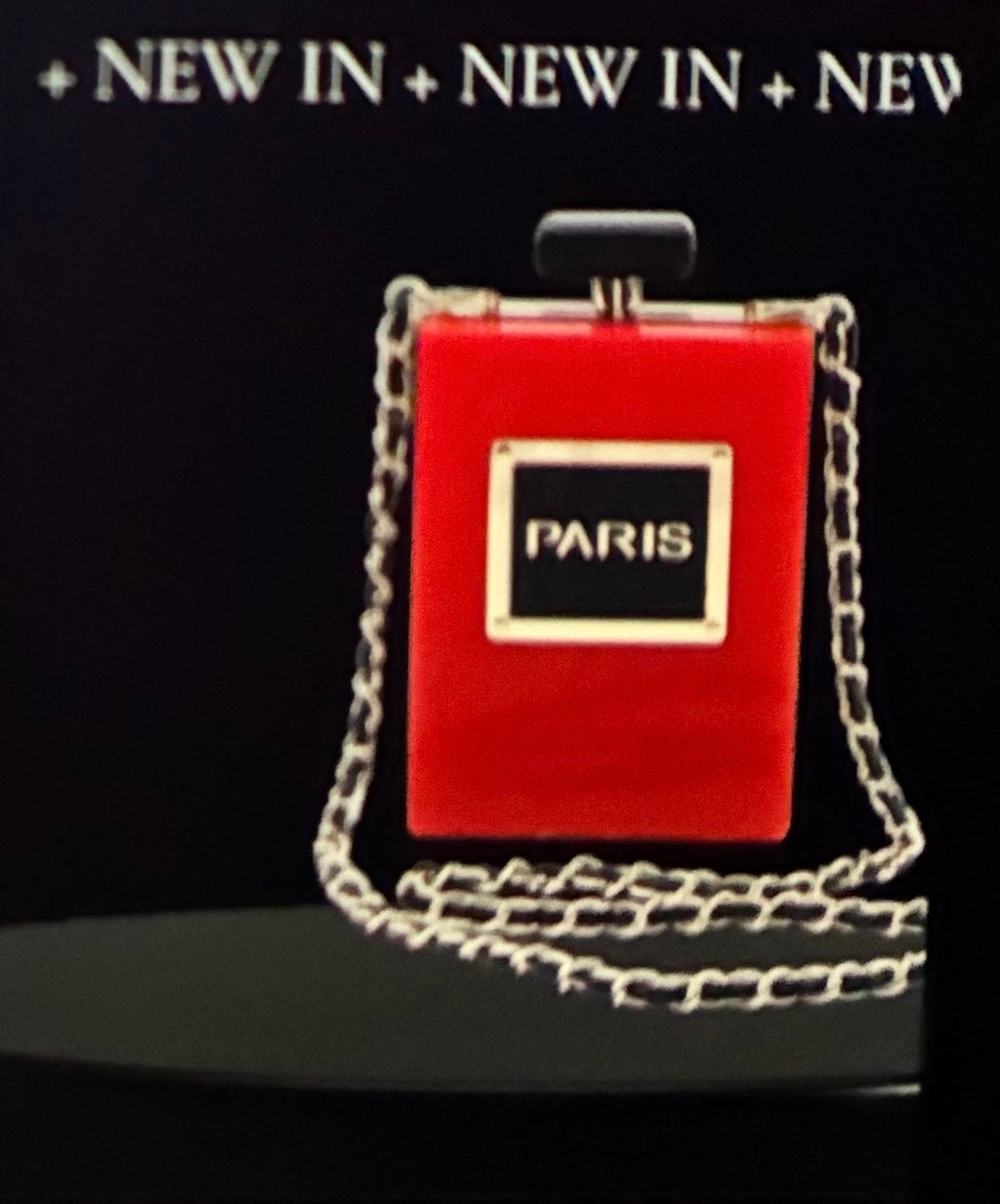 Perfume bottle clutch