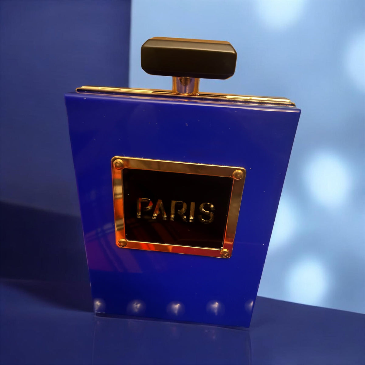 Perfume bottle clutch